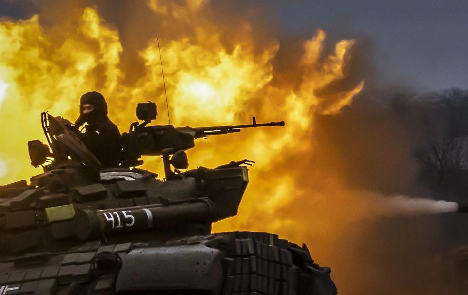 A Ukrainian soldier on a tank performs firing practice at special shooting range in Zaporizhzhia - Anadolu Agency/Anadolu