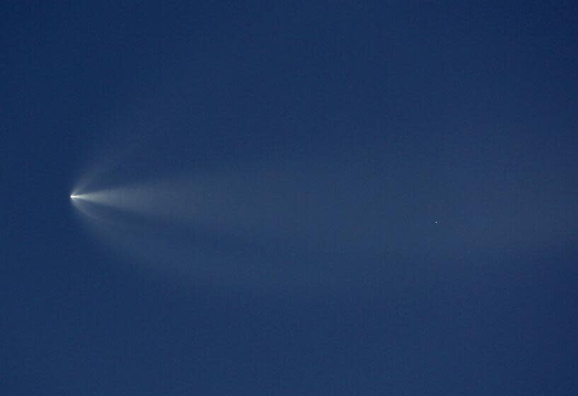 A Falcon 9 rocket launched from Vandenberg Space Force Base at dusk carried 22 Starlink internet satellites into low-Earth orbit as seen from Whittier, California on April 1, 2024.