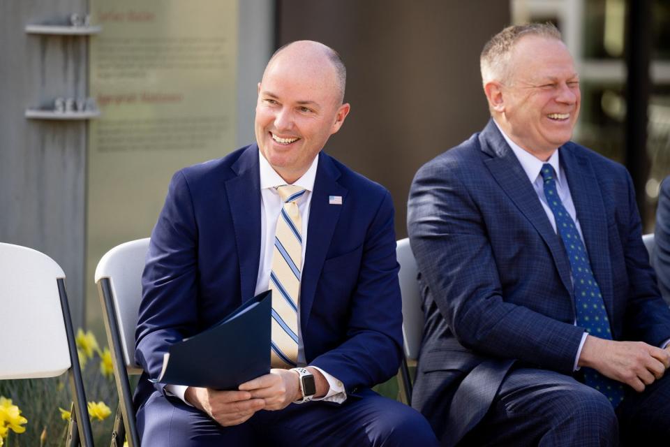 Gov. Spencer Cox and Rep. Doug Owens, D-Millcreek, laugh during a press conference at the Jordan Valley Water Conservancy District's Conservation Garden Park in West Jordan on Monday. Officials announced a statewide water-wise landscaping incentive program to encourage residents to replace grass with water-efficient landscaping