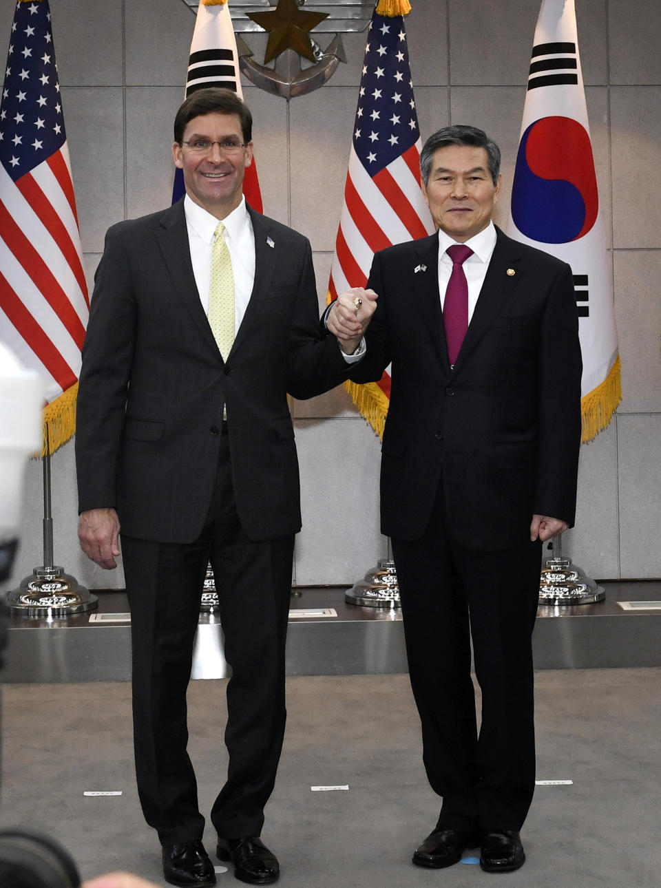 U.S. Defense Secretary Mark Esper, left, shakes hands with South Korean Defense Minister Jeong Kyeong-doo before their meeting Friday, Nov. 15, 2019, in Seoul, South Korea. (Kim Min-hee/Pool Photo via AP)