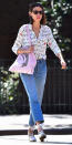 <p>Chung paired a face-covered button down with straight leg jeans, espadrilles, and a pink tote bag for a summer walk in New York City. She finished off the look with cat-eye sunnies (get a similar pair <a rel="nofollow noopener" href="https://click.linksynergy.com/fs-bin/click?id=93xLBvPhAeE&subid=0&offerid=465536.1&type=10&tmpid=2425&RD_PARM1=https%3A%2F%2Fwww.bloomingdales.com%2Fshop%2Fproduct%2Ftory-burch-cat-eye-sunglasses-52mm%3FID%3D1785874%2526CategoryID%3D1006924%2526LinkType%3D&u1=ISAlexaChungStreetStyle3.22JA" target="_blank" data-ylk="slk:here;elm:context_link;itc:0;sec:content-canvas" class="link ">here</a>). </p>