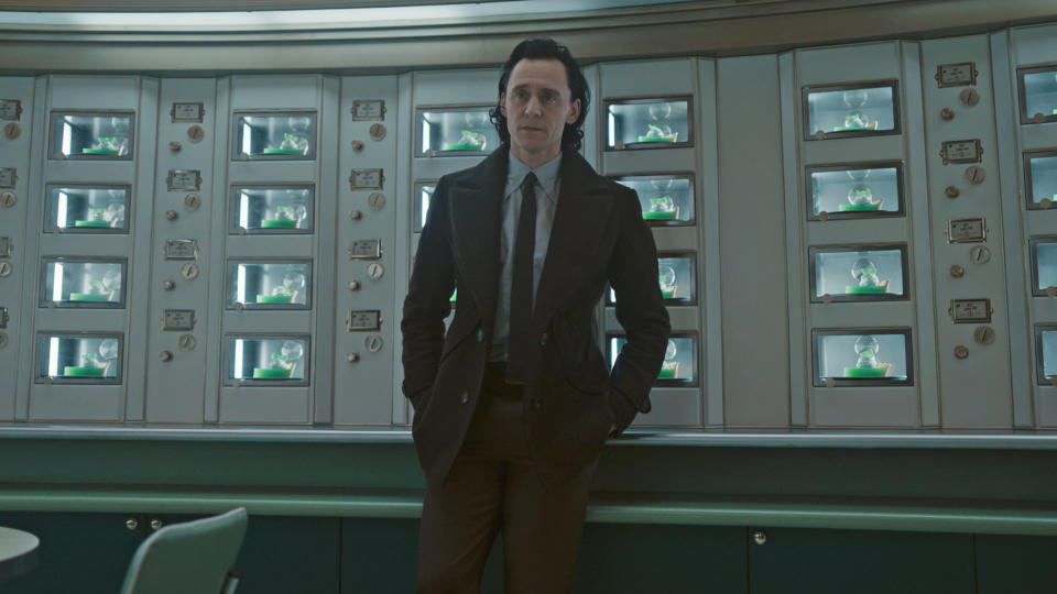 Loki leans against a desk in the TVA in Loki season 2