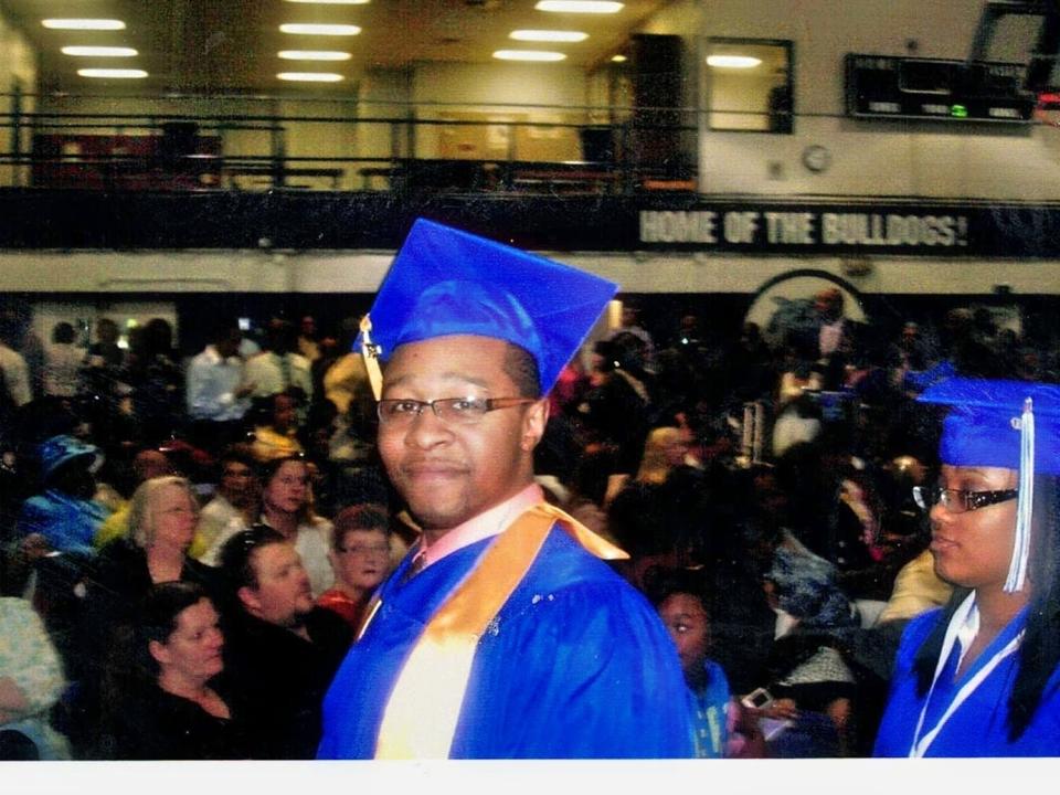 Jarrett Adams graduating from college in 2010