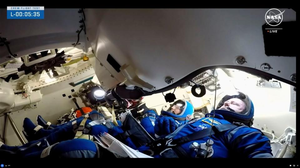 NASA astronauts Butch Wilmore, right and Suni Williams wait for liftoff inside the Boeing Starliner capsule at Space Launch Complex 41 Wednesday, June 5, 2024, in Cape Canaveral, Fla. The two astronauts are scheduled to liftoff on the Boeing Starliner capsule for a trip to the international space station. (NASA via AP)