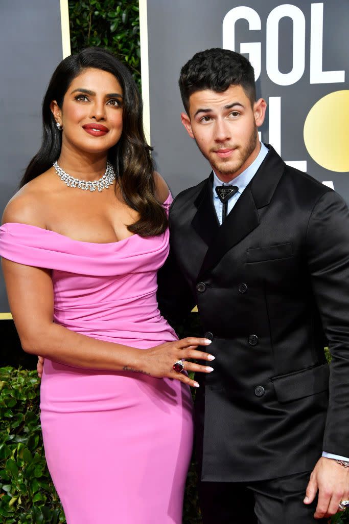 <p>The couple attended, and presented an award together, at the 2020 Golden Globes. Priyanka wore a pink off-the-shoulder gown by Cristina Ottaviano with Bulgari jewellery.</p>