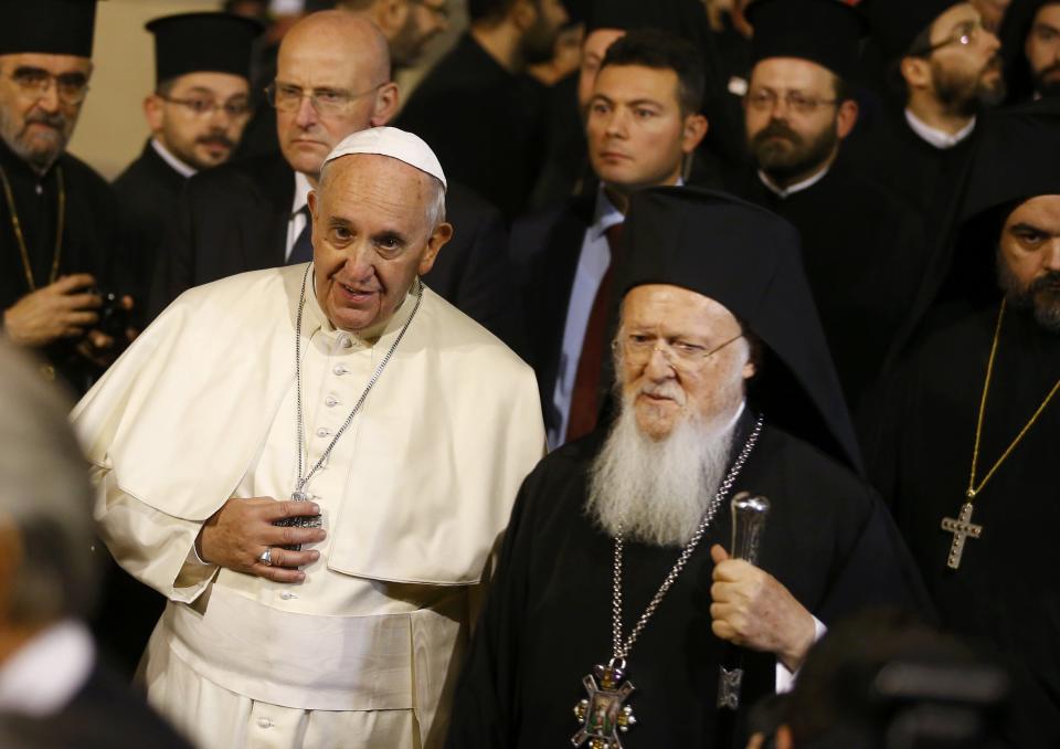 Pope Francis and Ecumenical Patriarch Bartholomew I of Constantinople (R) leave after an Ecumenical Prayer in the Patriarchal Church of Saint George in Istanbul November 29, 2014. (REUTERS/Osman Orsal)