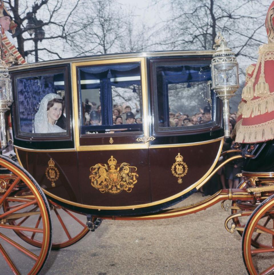 <p>Princess Alexandra wore a gown designed by John Cavanagh, made of Valenciennes lace.</p>