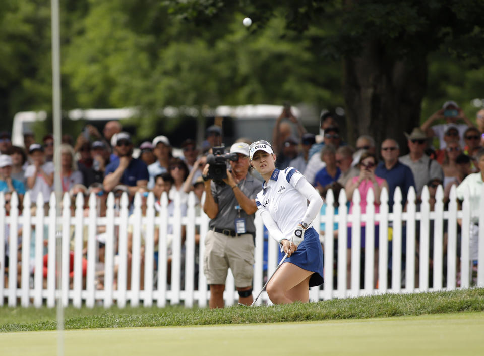 Nelly Korda hits onto the 18th green during the final round of the Meijer LPA Classic golf tournament, Sunday, June 20, 2021, in Grand Rapids, Mich. (AP Photo/Al Goldis)