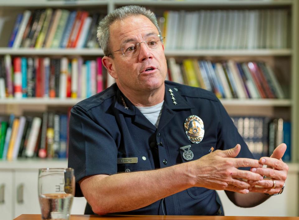 Los Angeles Police Department Chief Michel Moore is under fire for his comments about George Floyd's death.