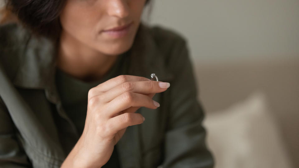 Woman holding an engagement ring