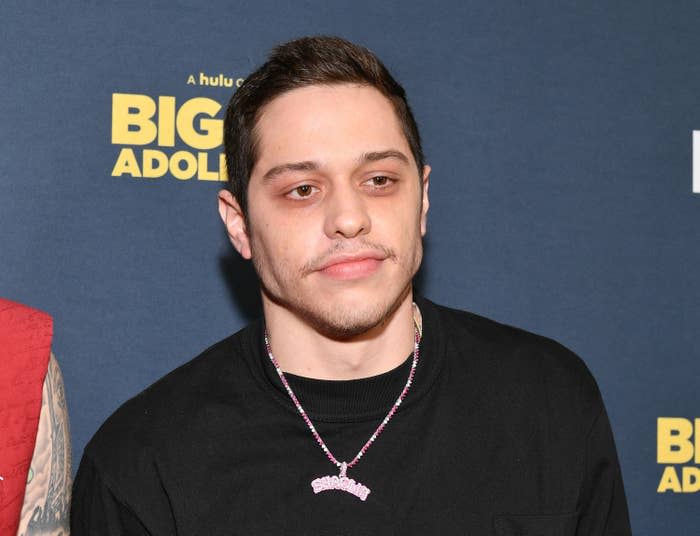 Pete Davidson is photographed at a movie premiere in 2020