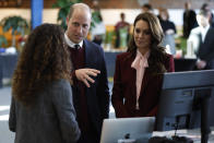 Britain's Prince William and Kate, Princess of Wales speak with startup companies that work at Greentown Labs as they tour the location for a view of green technologies developed in Somerville, Mass. Thursday, Dec. 1 2022. The Prince and Princess of Wales will attend the Earthshot Prize Awards Ceremony in Boston on Friday, according to the Royal Household. (CJ Gunter Pool Photo via AP)