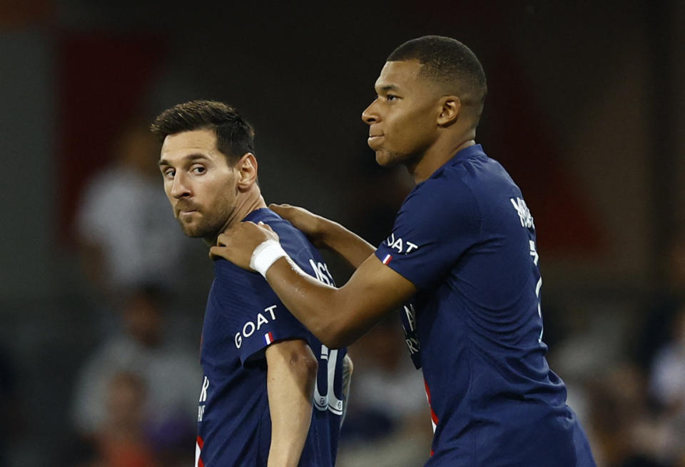 Teammates at Paris Saint-Germain, Lionel Messi (left) and Kylian Mbappe will face each other at the 2022 World Cup final.