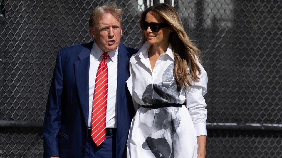 PHOTO: Former U.S. President Donald Trump and former first lady Melania Trump walk together as they prepare to vote at a polling station setup in the Morton and Barbara Mandel Recreation Center, Mar. 19, 2024, in Palm Beach, Fla.   (Joe Raedle/Getty Images)