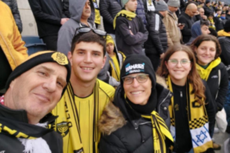 Father Ori, Netta, Ayelet, and sisters Alma-Ruth and Rona Epstein at a Beitar Jerusalem football match (Courtesy of the family)