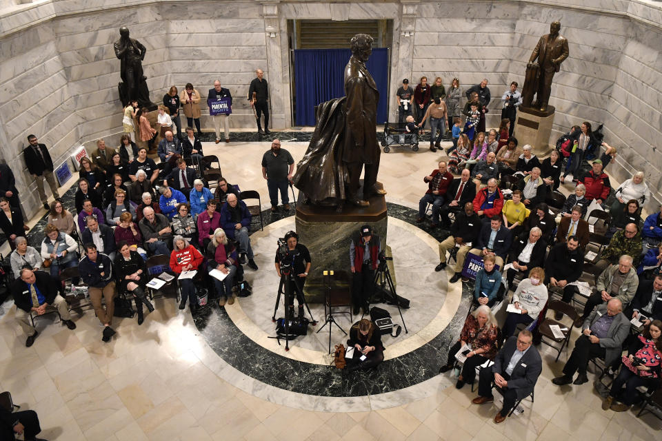 Members of the Faith and Family advocacy group, a pro life organization, hold a rally in the rotunda of the Kentucky State Capitol in Frankfort, Ky., Thursday, Feb. 16, 2023. The Kentucky Supreme Court on Thursday refused to allow abortions to resume in the state, rejecting a request to halt a near total ban of the procedure. (AP Photo/Timothy D. Easley)