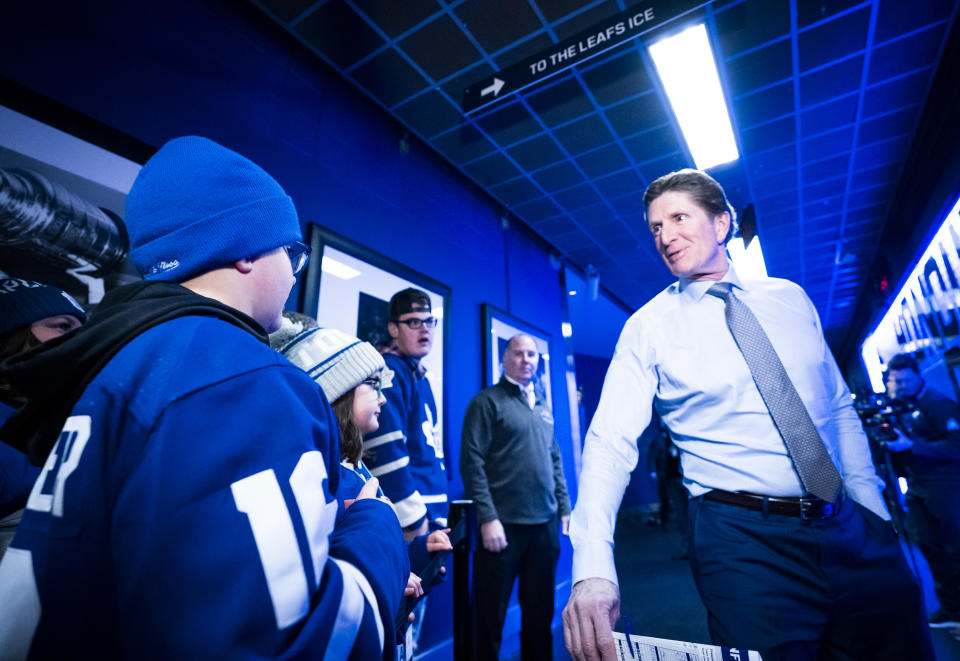 Mike Babcock will be back in the spotlight this season. (Photo by Mark Blinch/NHLI via Getty Images)