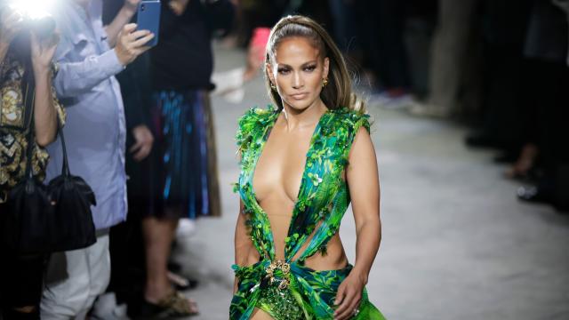 Jennifer Lopez Walks Versace Show In Green Dress