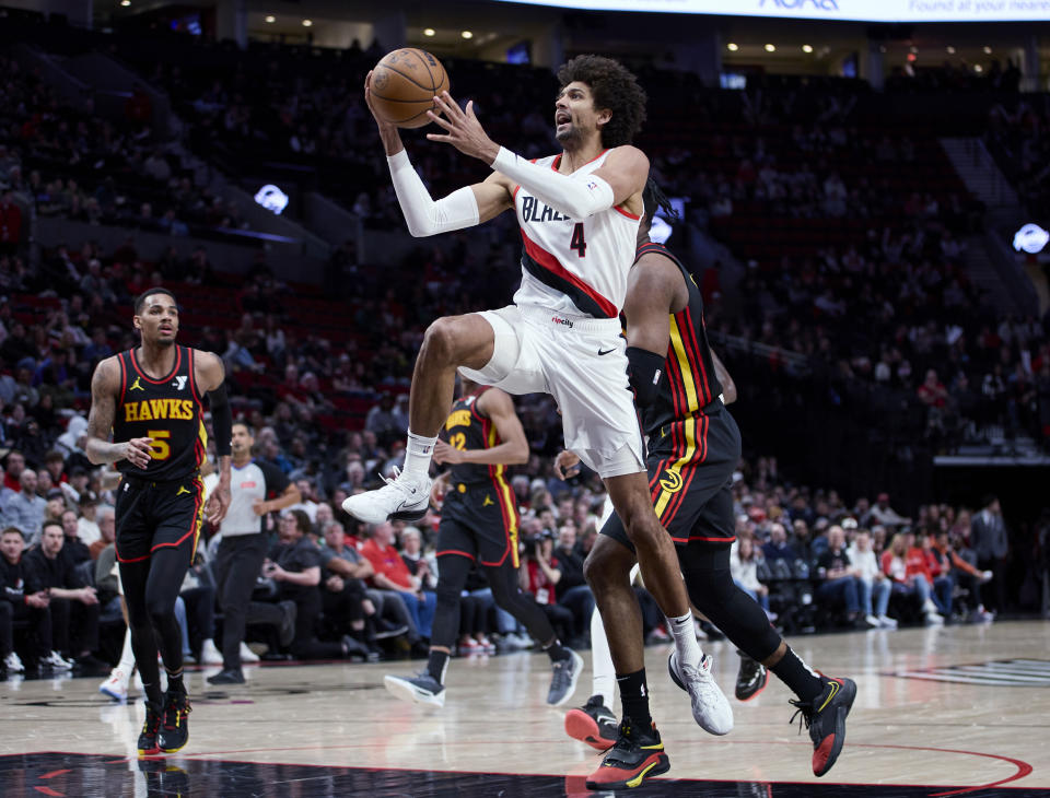 Portland Trail Blazers guard Matisse Thybulle shoots against the Atlanta Hawks during the second half of an NBA basketball game in Portland, Ore., Wednesday, March 13, 2024. (AP Photo/Craig Mitchelldyer)