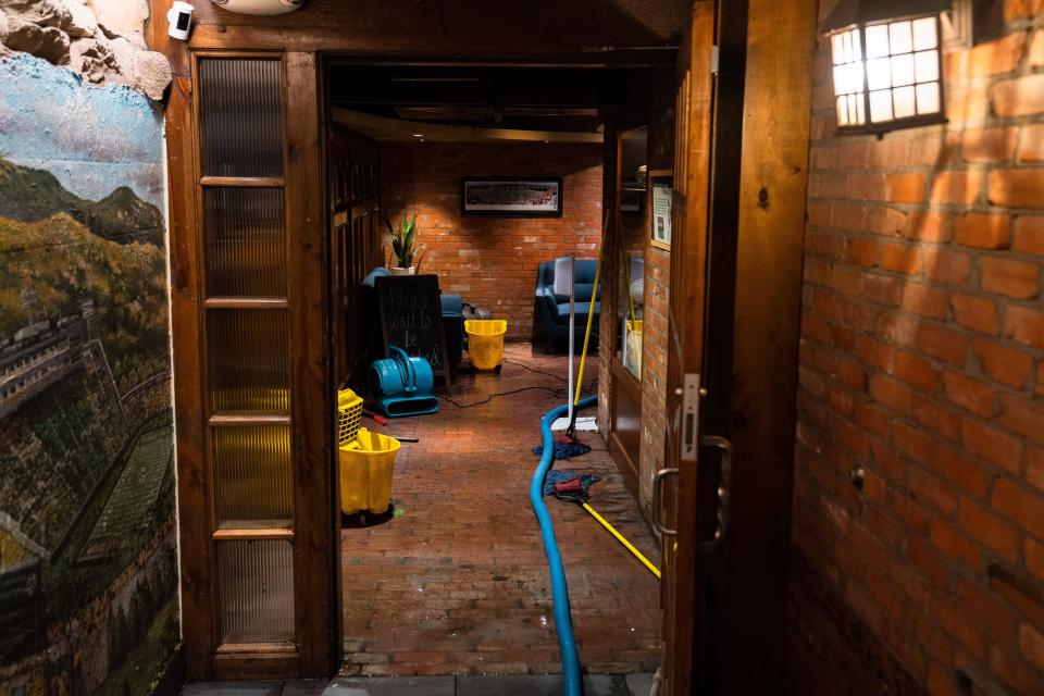 Flooding affects Sonny Lubick's Steakhouse after a heavy rainstorm in Fort Collins on Monday.