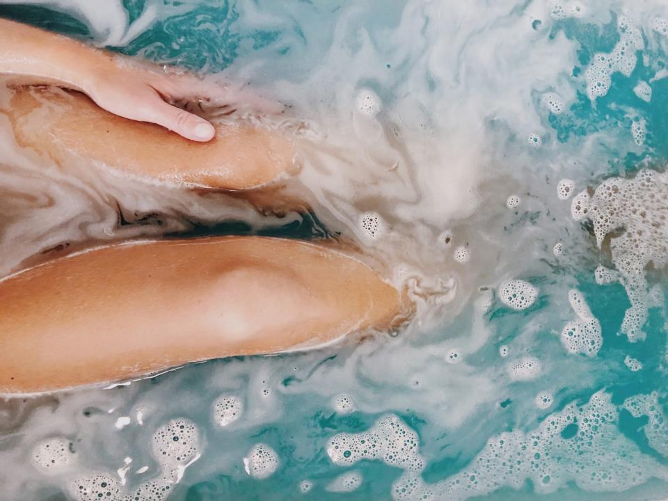 woman soaking in bathtub