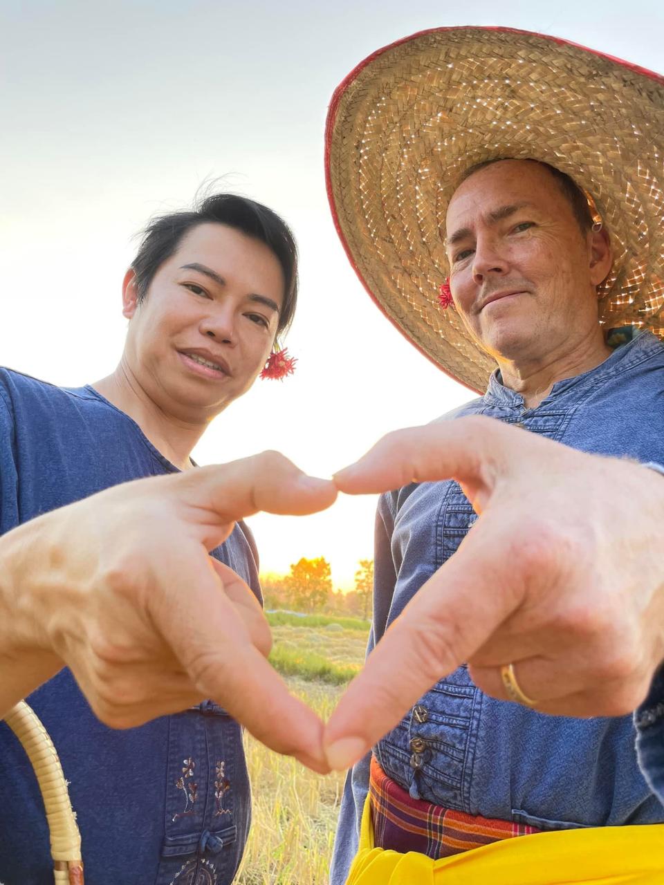 Chef Noopy Areerak, left, and husband Billy Manthy share a moment in Yasothon, Thailand, where they remarried in 2022. The couple owns Malakor Thai Café in West Palm Beach's Northwood district.