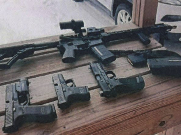 A photo of some of the guns the suspect said he owns, according to federal court documents.