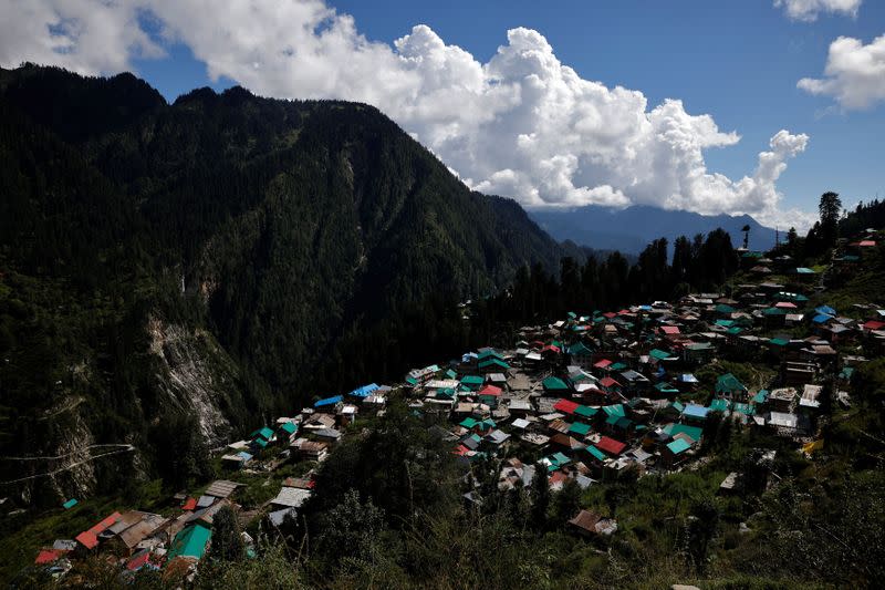 The Wider Image: Doctors scale rockslides, invoke gods to vaccinate Himalayan villages