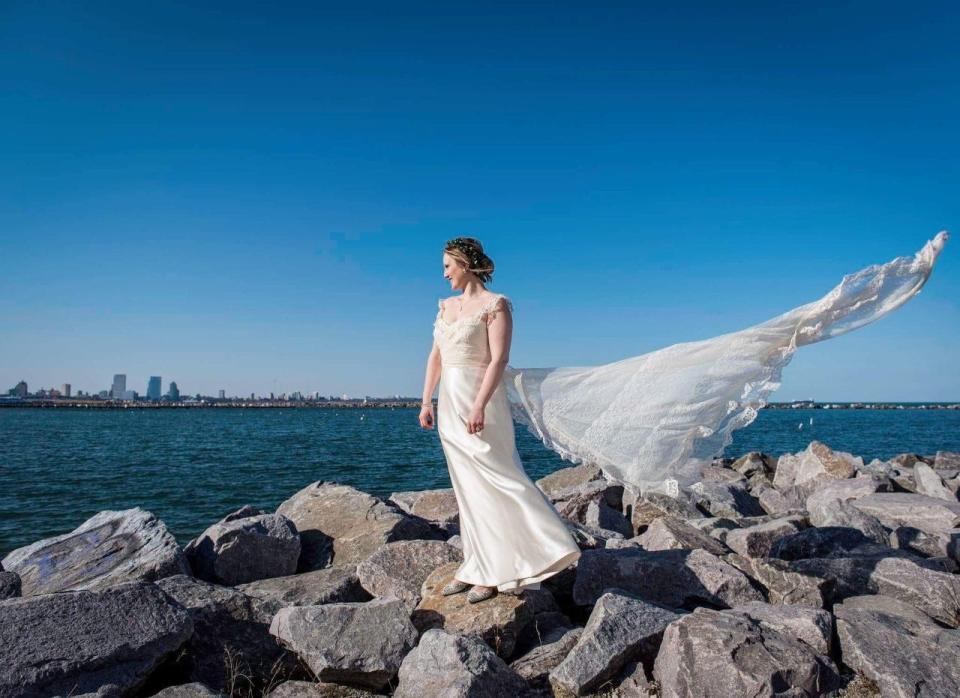 Milwaukee fashion designer Laura Bavlnka transformed Jessica Sheridan's mother's wedding gown into a new wedding dress (seen here) for Sheridan to wear on her big day.