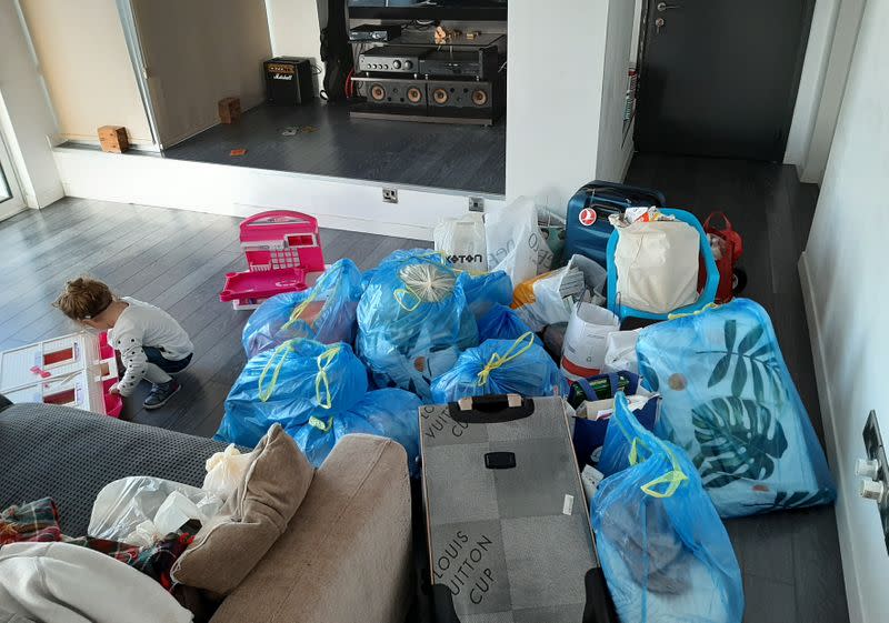 Bags and suitcases containing the belongings of Deniz Birinci and her daughter Olivia Shule are seen in an apartment, following the coronavirus disease (COVID-19) outbreak, in Nicosia