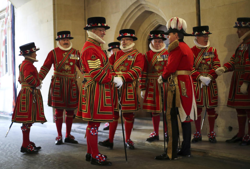 Members of the Yeoman Guard ahead of the official State Opening of Parliament in London, Monday Oct. 14, 2019. (Hannah McKay/Pool via AP)