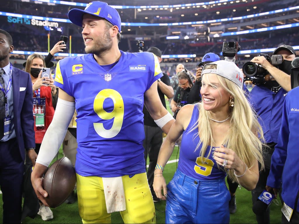 Matthew Stafford of the Los Angeles Rams and his wife Kelly Stafford celebrate after the Rams defeated the San Francisco 49ers on 30 January 2022 in Inglewood, California (Christian Petersen/Getty Images)