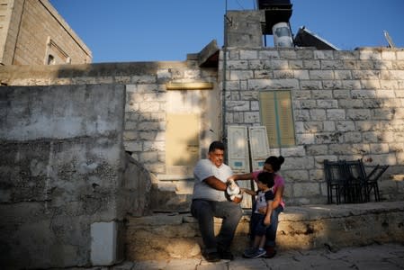 The Wider Image: Israel's settlers and the Palestinians they live among