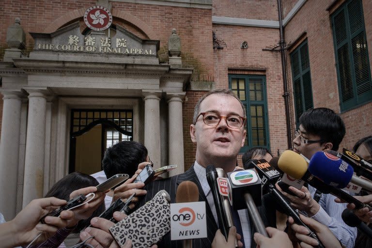 Michael Vidler, lawyer of a transsexual woman seeking to marry her boyfriend, talks to the press in Hong Kong on May 13, 2013. The woman has won a groundbreaking court appeal allowing her to marry her boyfriend and forcing the Hong Kong government to re-write the city's marriage laws