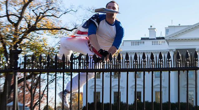 The moment the intruder scaled the fence gaining access into the White House. Source: Supplied.