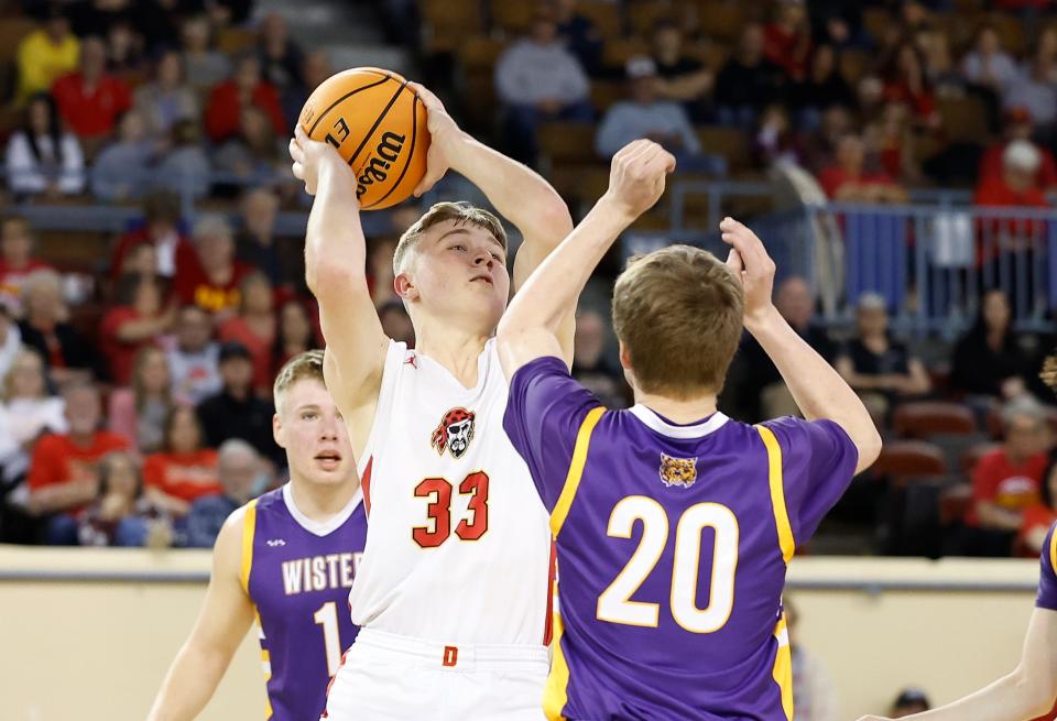 Dale's Dayton Forsythe goes to the basket against Wister's Riley Crane during a Class 2A state tournament quarterfinal game at State Fair Arena on Tuesday.