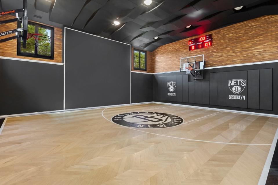 A half court for basketball is just one of many ways to stay fit — and free from boredom — inside. Hedgerow Exclusive Properties