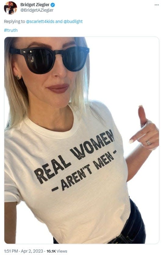 Screenshot of a Tweet from Sarasota School Board Chairwoman Bridget Ziegler where she points to her shirt that reads "real women aren't men", which she posted to her Twitter account April 2.