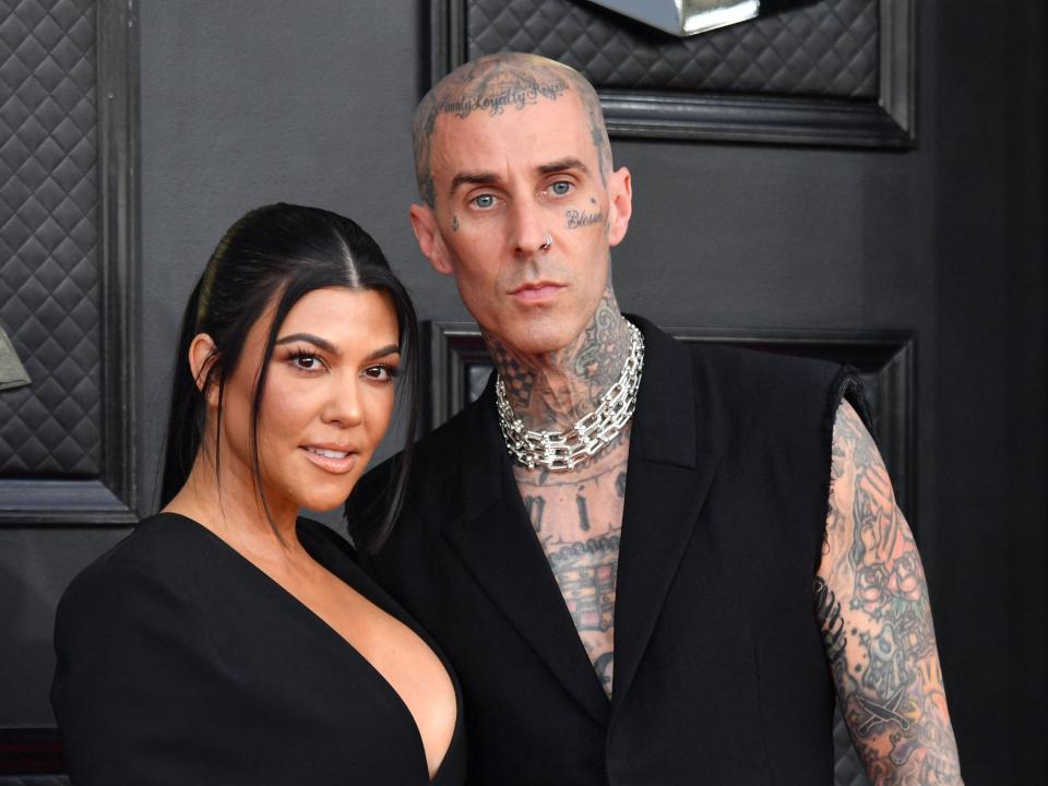 Kourtney Kardashian and musician Travis Barker arrive for the 64th Annual Grammy Awards at the MGM Grand Garden Arena in Las Vegas on April 3, 2022.