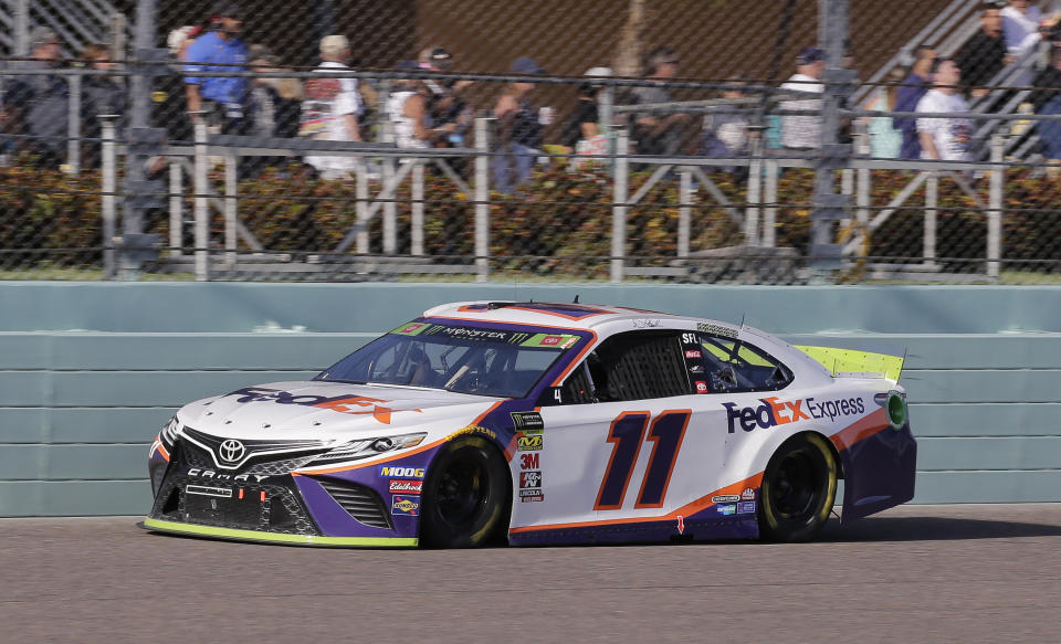 Denny Hamlin drives on the front stretch during a NASCAR Cup Series auto race on Sunday, Nov. 17, 2019, at Homestead-Miami Speedway in Homestead, Fla. Hamlin is one of four drivers running for the championship. (AP Photo/Terry Renna)