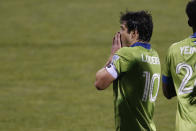 Seattle Sounders' Nicolas Lodeir reacts to missing a shot against the Columbus Crew during the second half of the MLS Cup championship game Saturday, Dec. 12, 2020, in Columbus, Ohio. The Crew won 3-0. (AP Photo/Jay LaPrete)