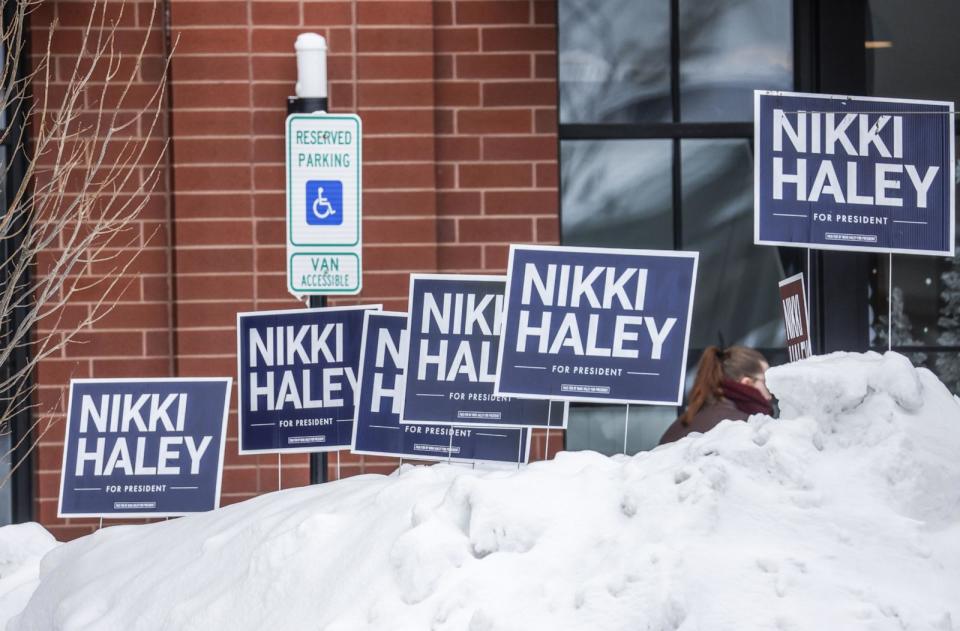 PHOTO: Campaign signs are placed in snow before Former South Carolina Governor and Republican presidential candidate Nikki Haley speaks to voters at the Toast event location in Ankeny, Iowa, Jan. 11, 2024. (Tannen Maury/UPI/Shutterstock)
