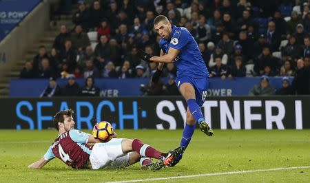 Britain Football Soccer - Leicester City v West Ham United - Premier League - King Power Stadium - 31/12/16 Leicester City's Islam Slimani in action with West Ham United's Havard Nordtveit Action Images via Reuters / Matthew Childs Livepic