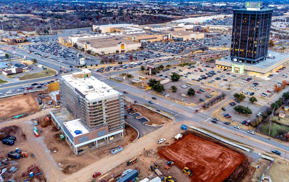 Construction on OAK during December oversees a bustling parking lot at Penn Square Mall