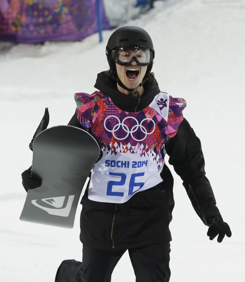 Switzerland's Iouri Podladtchikov celebrates after his half pipe run during the men's snowboard halfpipe final at the Rosa Khutor Extreme Park, at the 2014 Winter Olympics, Tuesday, Feb. 11, 2014, in Krasnaya Polyana, Russia. Podladtchikov won the gold medal. (AP Photo/Andy Wong)