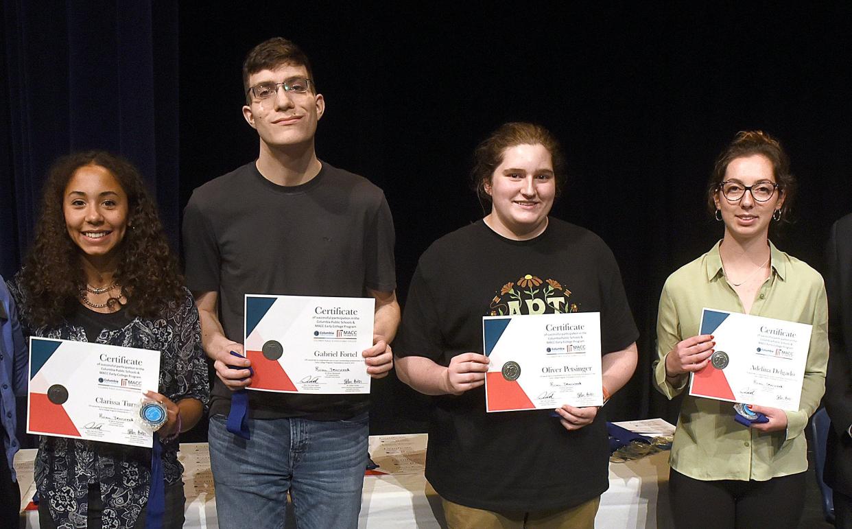 A few of the graduates of the Columbia Public Schools and Moberly Area Community College Early College Program received their certificate of completion on Thursday at Battle High School. From left, Clarissa Turner, Gabriel Fortel, Oliver Petsinger and Adelina Delgado.