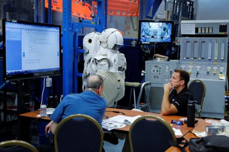 NASA Commercial Crew Astronaut Josh Cassada goes through a space suit fitting session at the Johnson Space Center in Houston