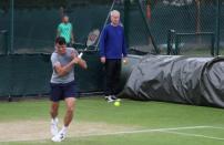 Britain Tennis - Wimbledon Preview - All England Lawn Tennis & Croquet Club, Wimbledon, England - 26/6/16 Canada's Milos Raonic watched by coach John McEnroe during practice Reuters / Paul Childs
