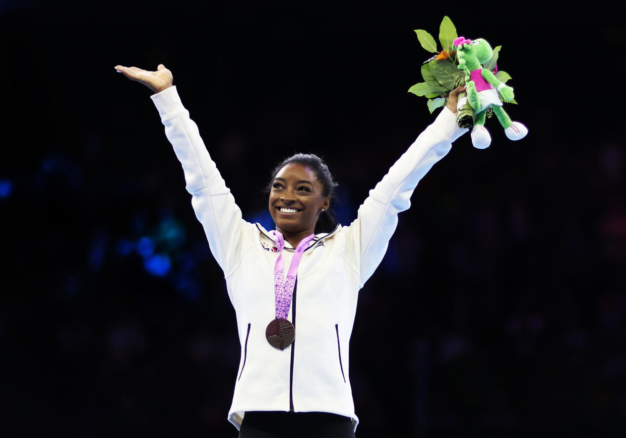 ANTWERP, BELGIUM - OCTOBER 08: Gold Medalist Simone Biles of USA poses for photographs on the podium for the Women's Floor Final during Day Nine of the 2023 Artistic Gymnastics World Championships on October 08, 2023 in Antwerp, Belgium. (Photo by Naomi Baker/Getty Images)