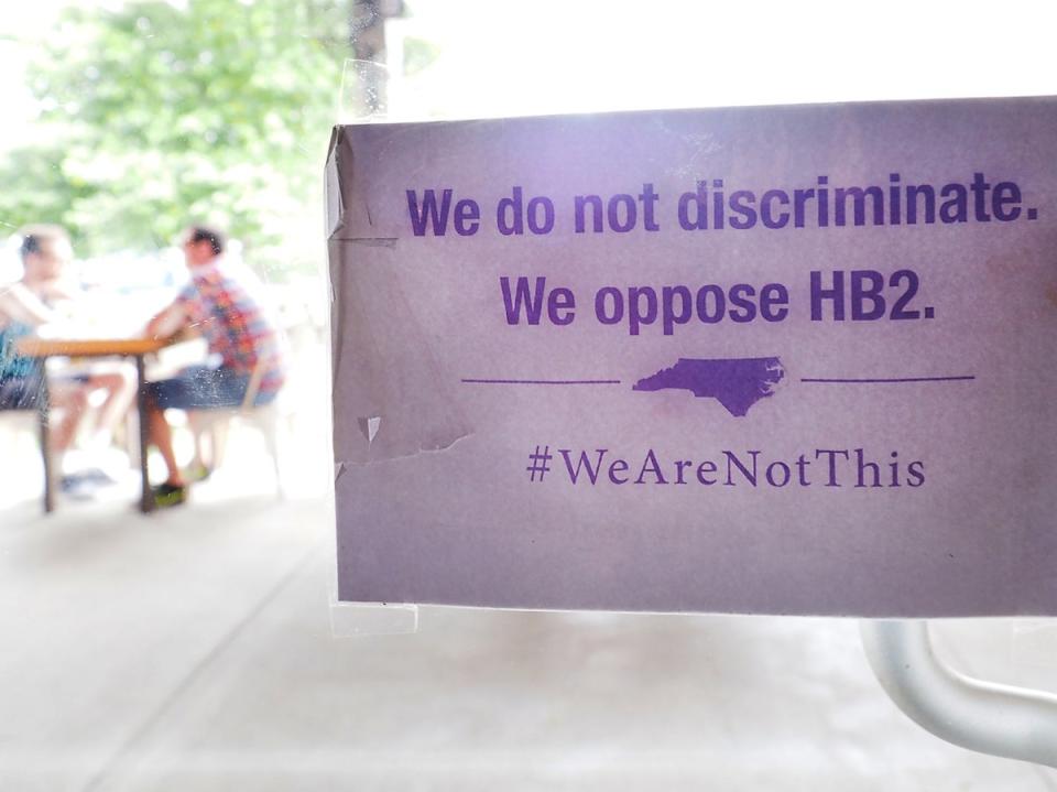 A sign protesting North Carolina’s HB2 law at Bull McCabe’s Irish Pub in Durham, North Carolina, 2016 (Sara D. Davis/Getty Images)